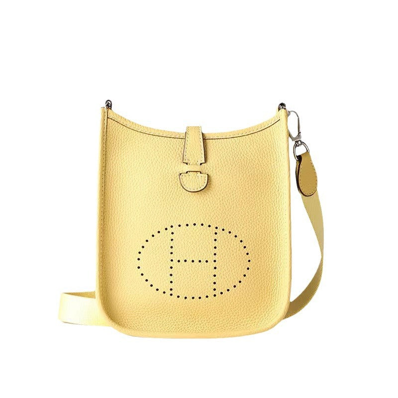 Women's New Fashion Joker Cowhide Shoulder Crossbody Bag with A High Sense of Hollowing Out The Commuter Bag.